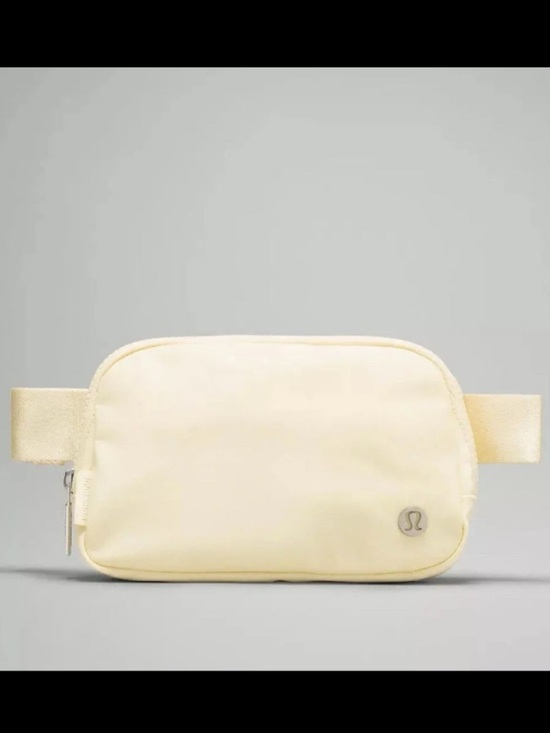 lululemon athletica Handbags - Lululemon Everywhere Wordmark Crossbody Belt Bag 1L - Light Yellow